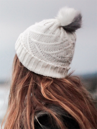 Knitted white pompom cap